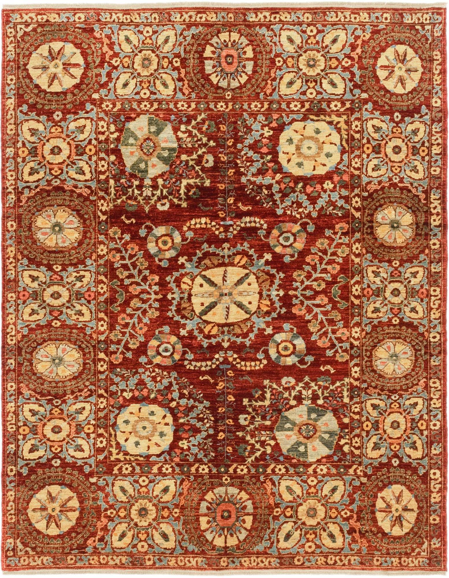A 4x6 rectangular Ariana Ziegler rug featuring a traditional tribal pattern in rich reds with cream, blue, and gold floral motifs.