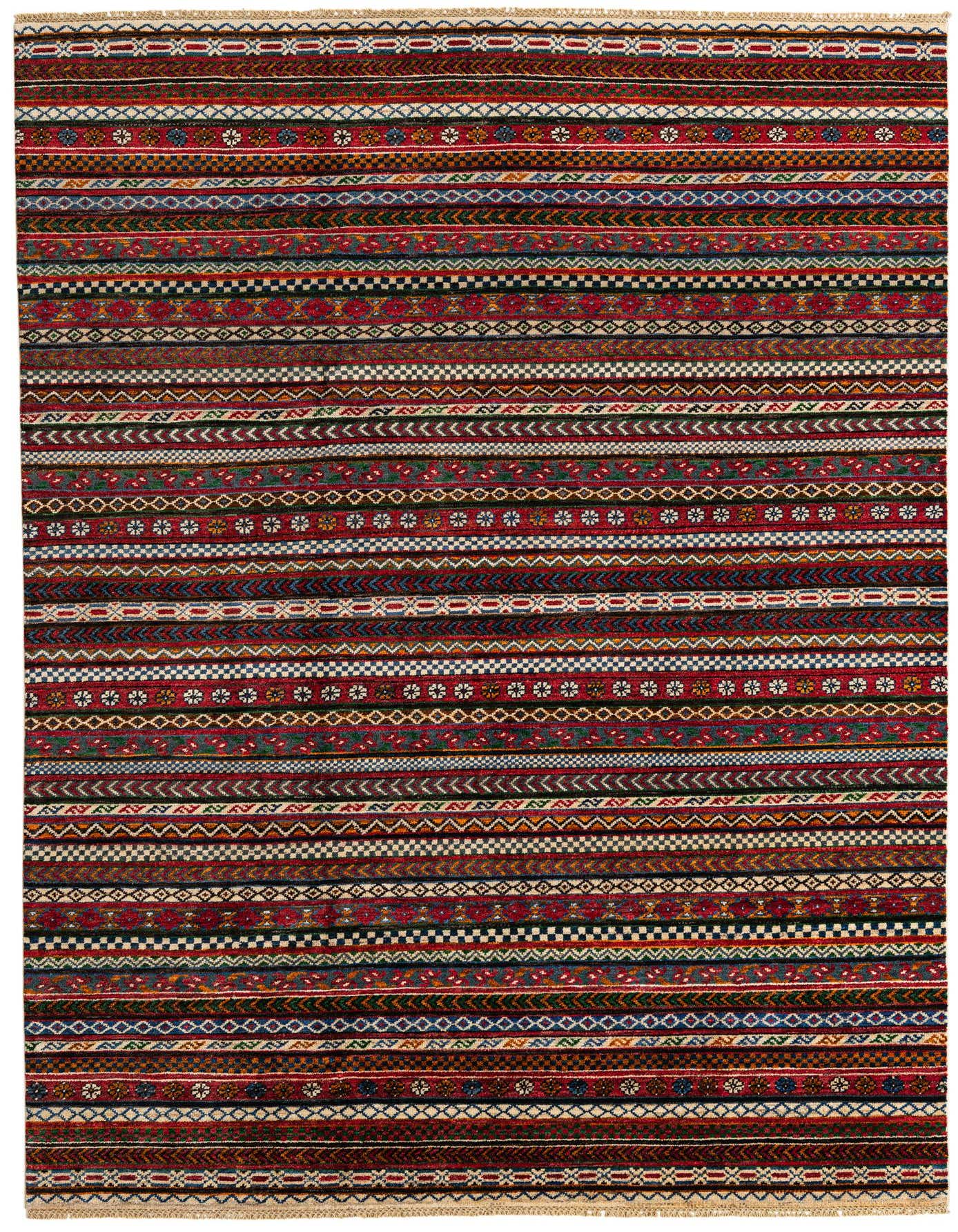 A 7x10 rectangular Ariana Ziegler rug featuring a vibrant striped pattern with various geometric motifs in reds, blues, greens, and creams.