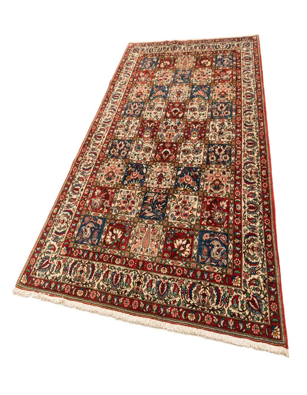 A 6x9 rectangular Bachtiar Sharekord rug featuring a traditional patchwork design in reds, blues, and creams.