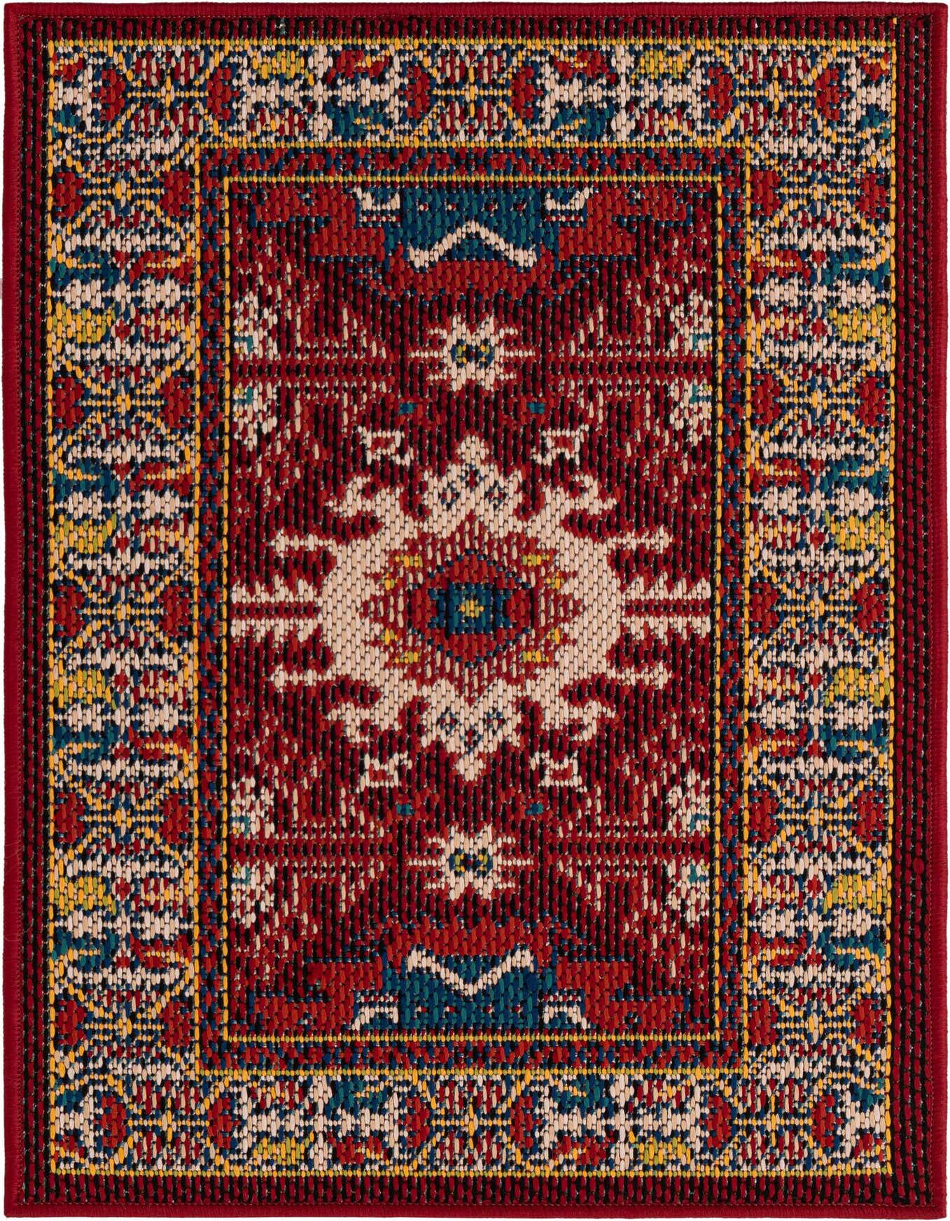 A 2x3 rectangular Baja Outdoor rug featuring a modern red, yellow, and blue geometric pattern, suitable for indoor or outdoor use.