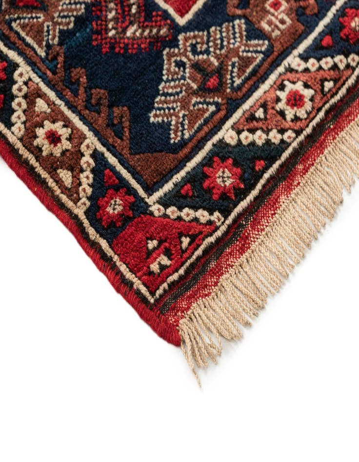 Detail image of  4' 3 x 6' 10  Hand Knotted Balouch Wool Rug