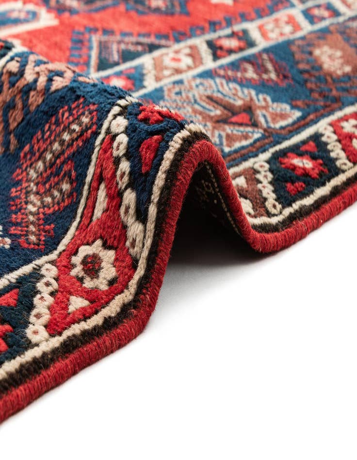 Detail image of  4' 3 x 6' 10  Hand Knotted Balouch Wool Rug