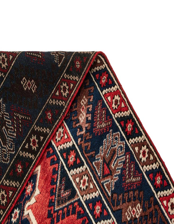 Detail image of  4' 3 x 6' 10  Hand Knotted Balouch Wool Rug