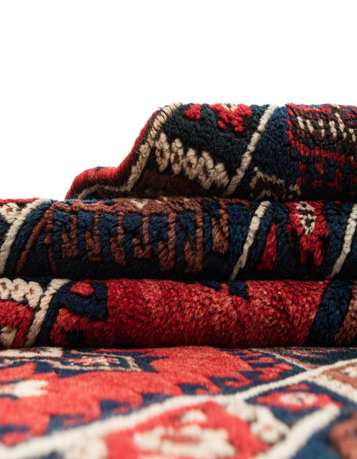 Detail image of  4' 3 x 6' 10  Hand Knotted Balouch Wool Rug