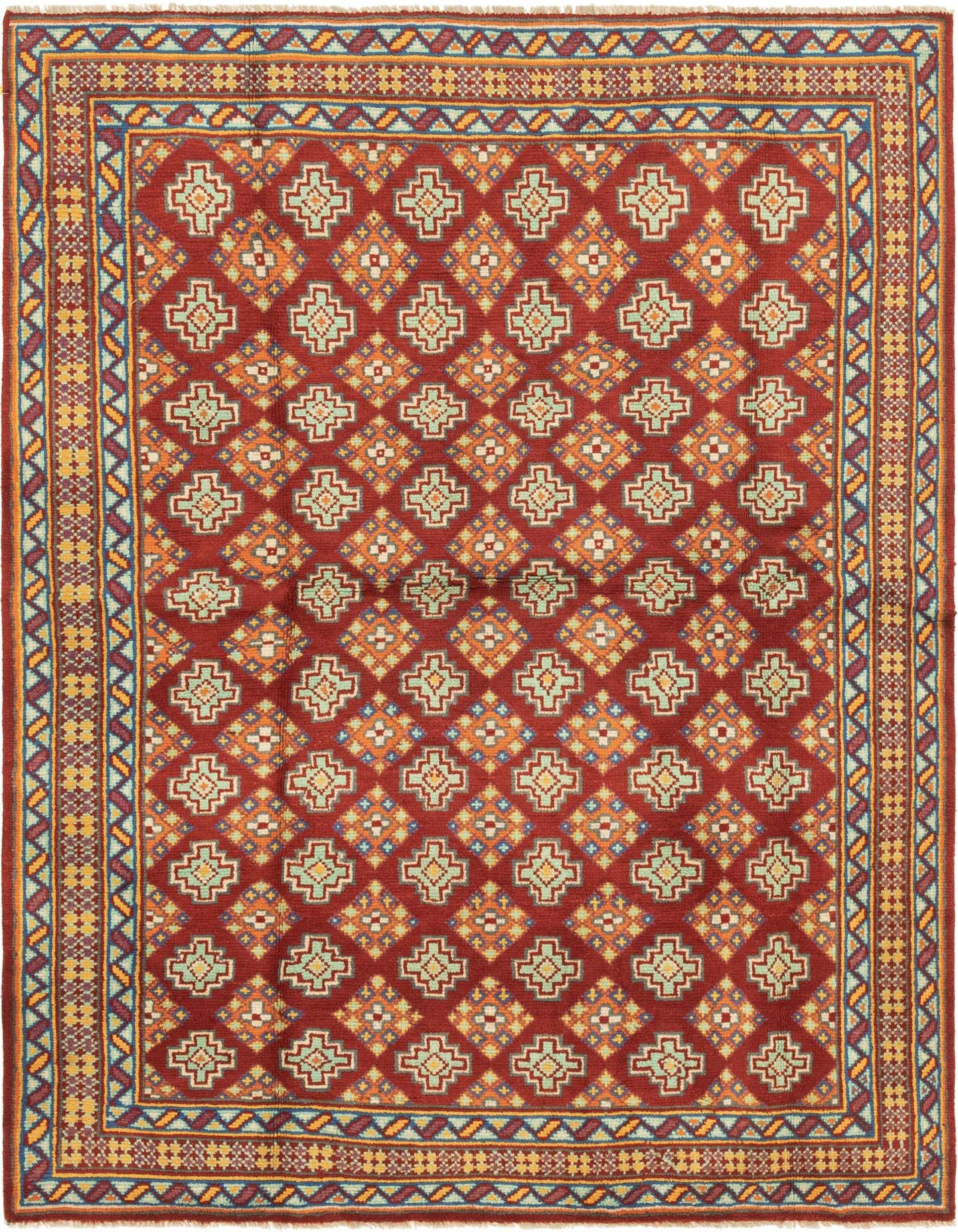 A 6x9 rectangular Balouch rug with a deep red field and intricate tribal geometric patterns in orange, blue, and cream.