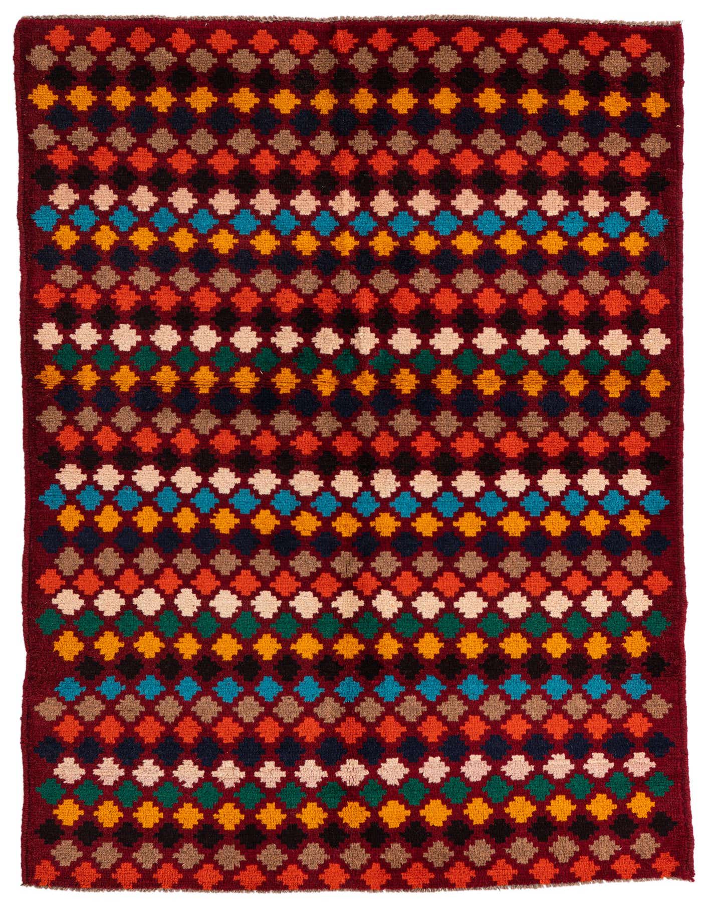 A 4x6 rectangular Balouch rug with a deep red background and a vibrant, repeating diamond pattern in various colors like orange, blue, black, beige, and green.