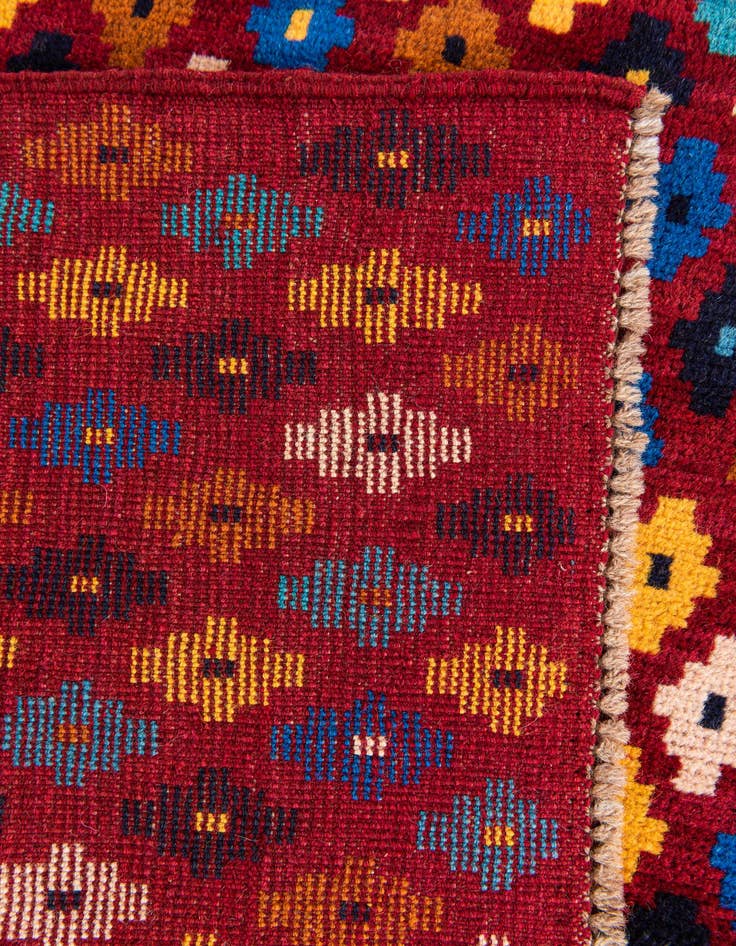 Detail image of  4' 3 x 5' 7  Hand Knotted Balouch Wool Rug