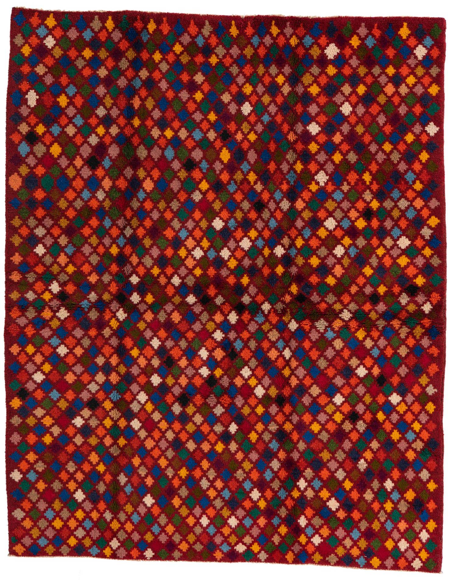 A 5x8 rectangular Balouch rug with a vibrant tribal pattern of multicolored diamonds on a rich red background.