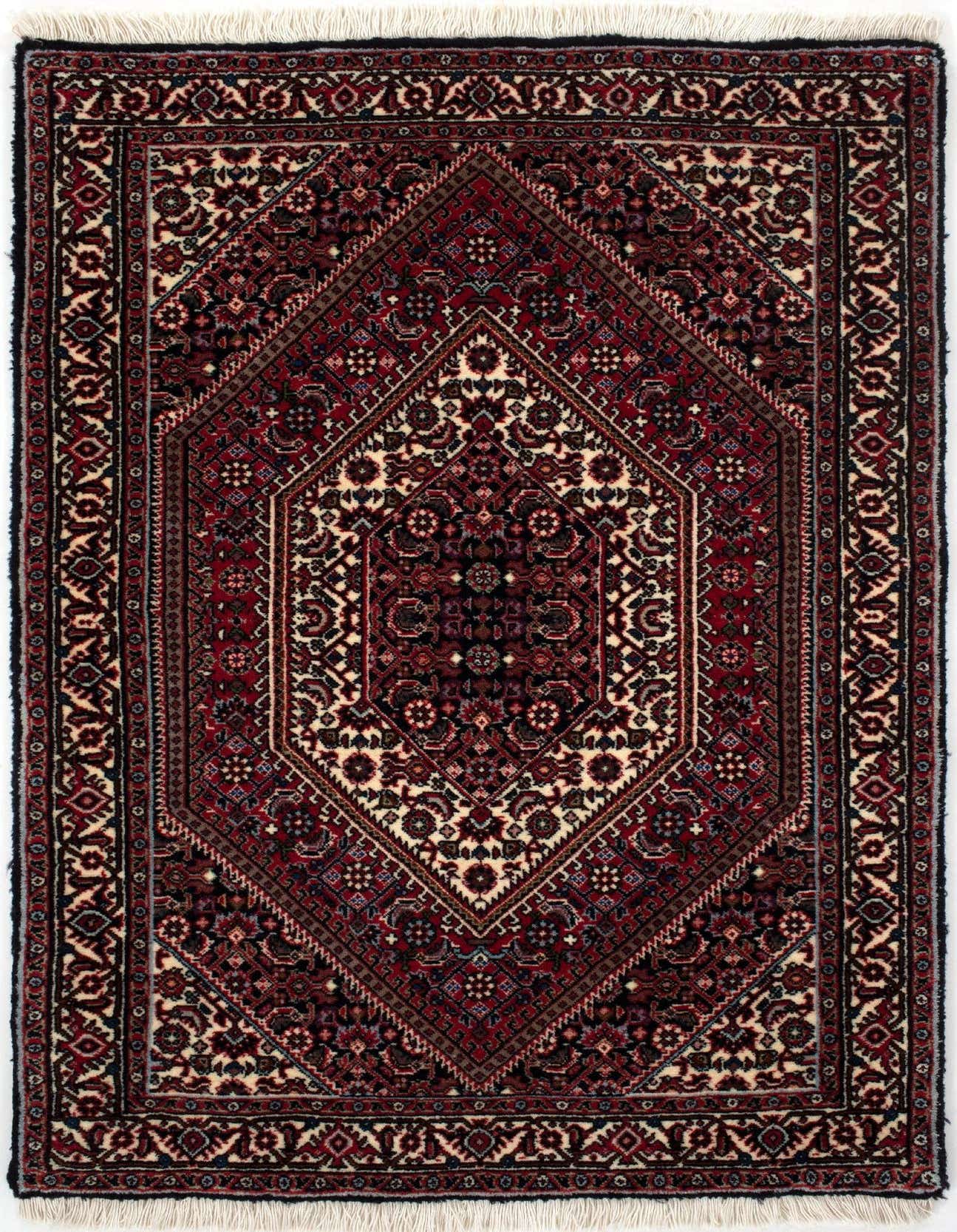A 2x3 rectangular Bidjar fine rug in reds with intricate traditional patterns and a central medallion, suitable for an entryway.