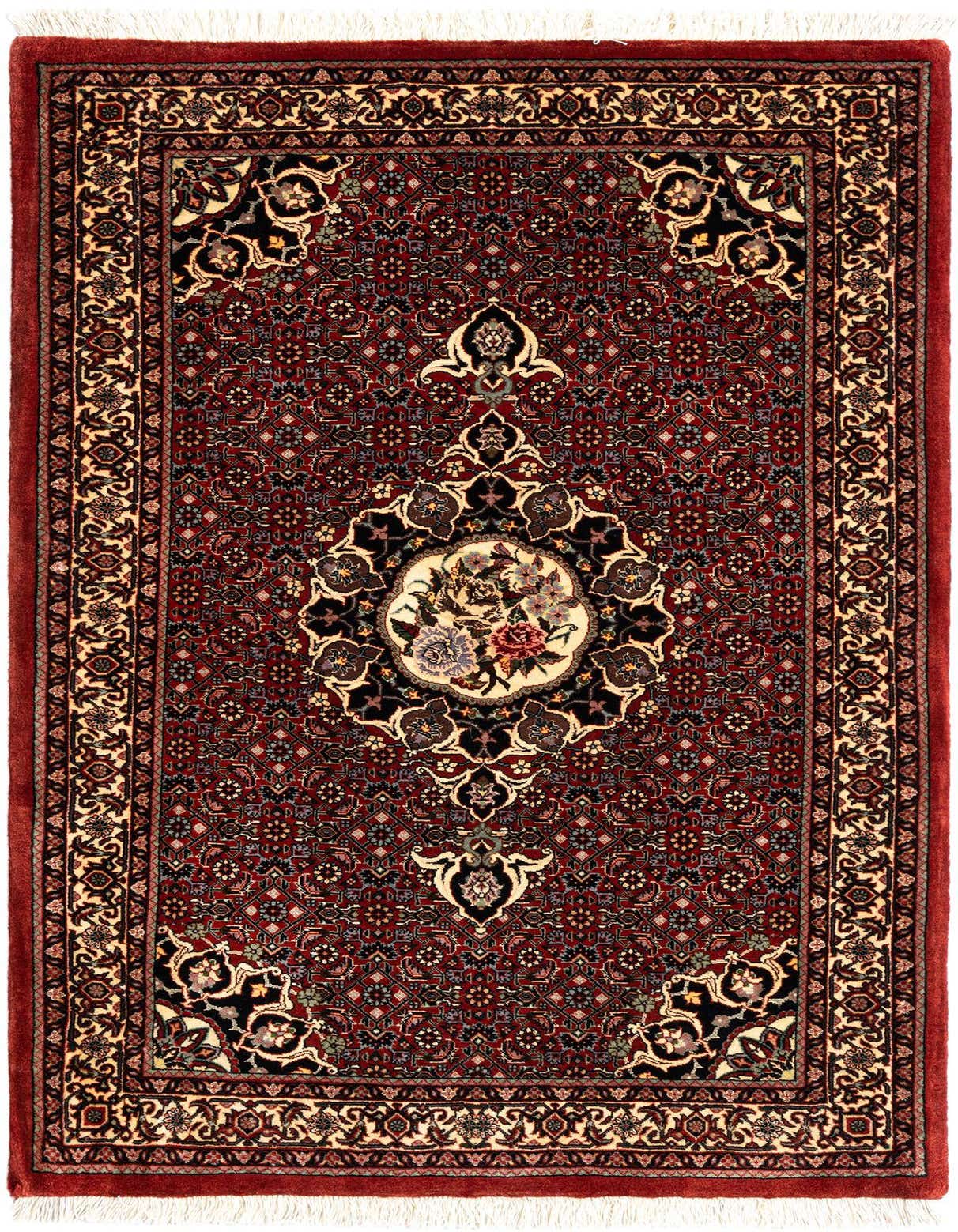 A 3x5 rectangular red Persian wool rug with an intricate floral medallion pattern and fringed edges, perfect for an entryway.
