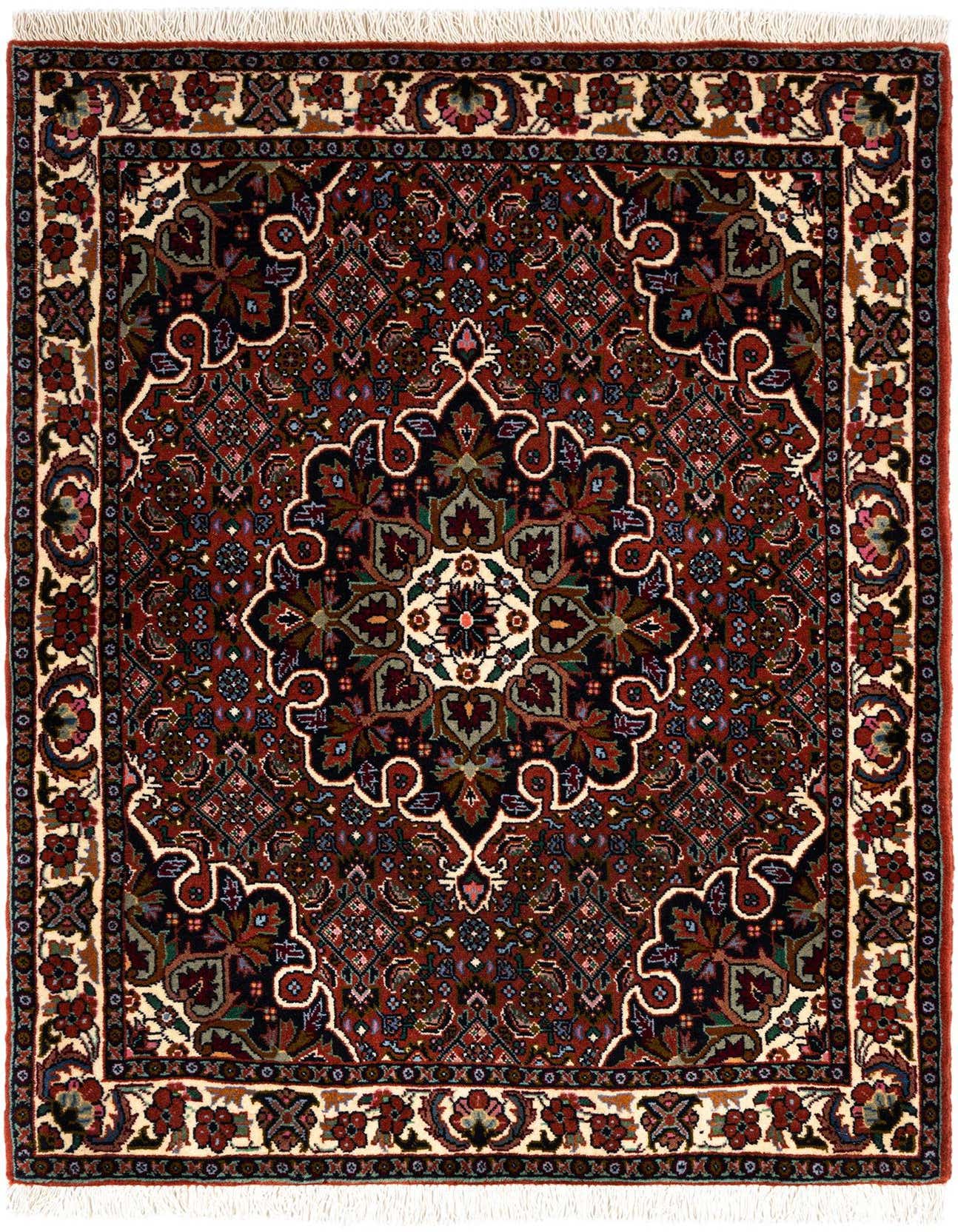 A 2x3 rectangular Bidjar wool rug featuring a complex traditional pattern in rich reds, creams, and dark accents, with white fringe.