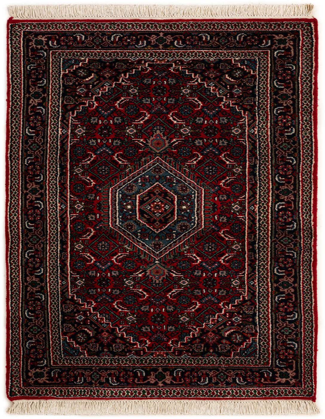 A 3x5 rectangular Bidjar rug featuring a traditional Oriental medallion pattern in deep reds, blues, and creams, with white fringe.