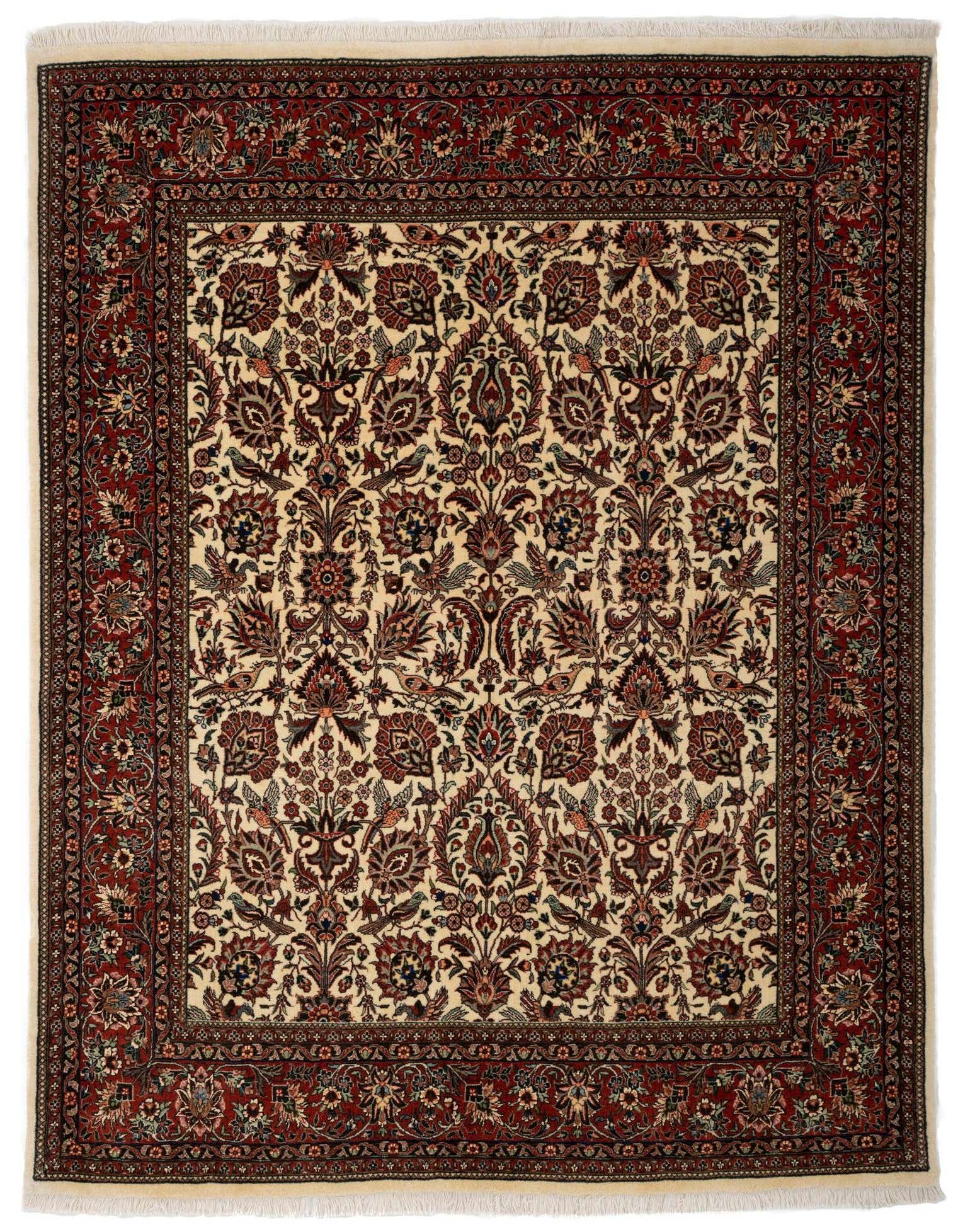 A 4x6 rectangular Persian rug with a cream field and intricate red, blue, and brown floral patterns, bordered by a rich red frame.
