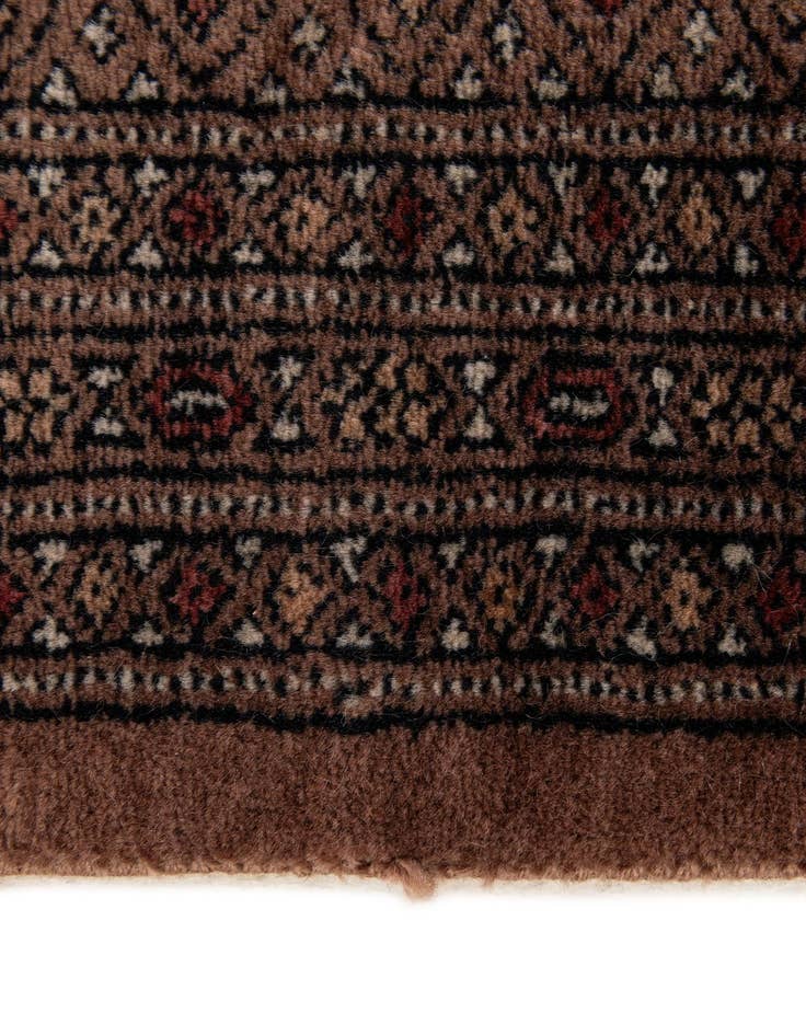 Detail image of  4' 2 x 5' 10  Hand Knotted Bokhara Oriental Wool Rug