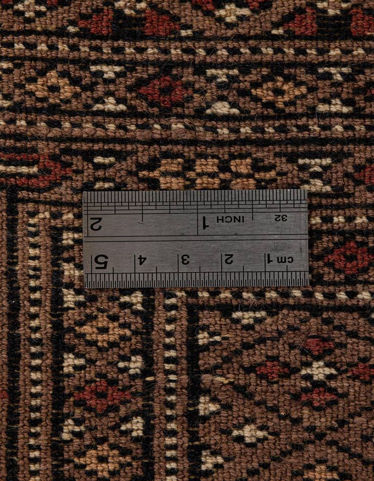 Detail image of  4' 2 x 5' 10  Hand Knotted Bokhara Oriental Wool Rug