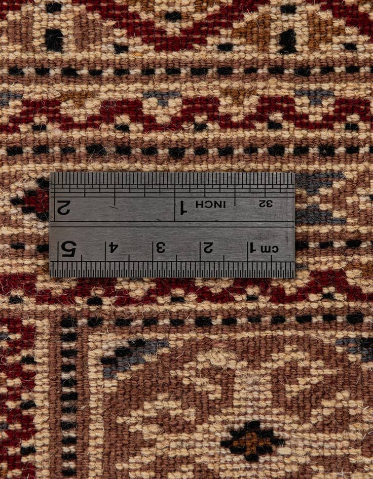 Detail image of  4' 3 x 6' 2  Hand Knotted Bokhara Wool Rug