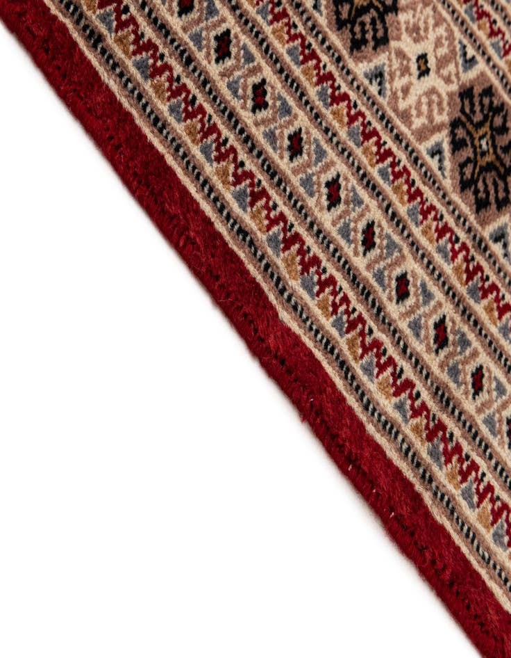 Detail image of  4' 3 x 6' 2  Hand Knotted Bokhara Wool Rug