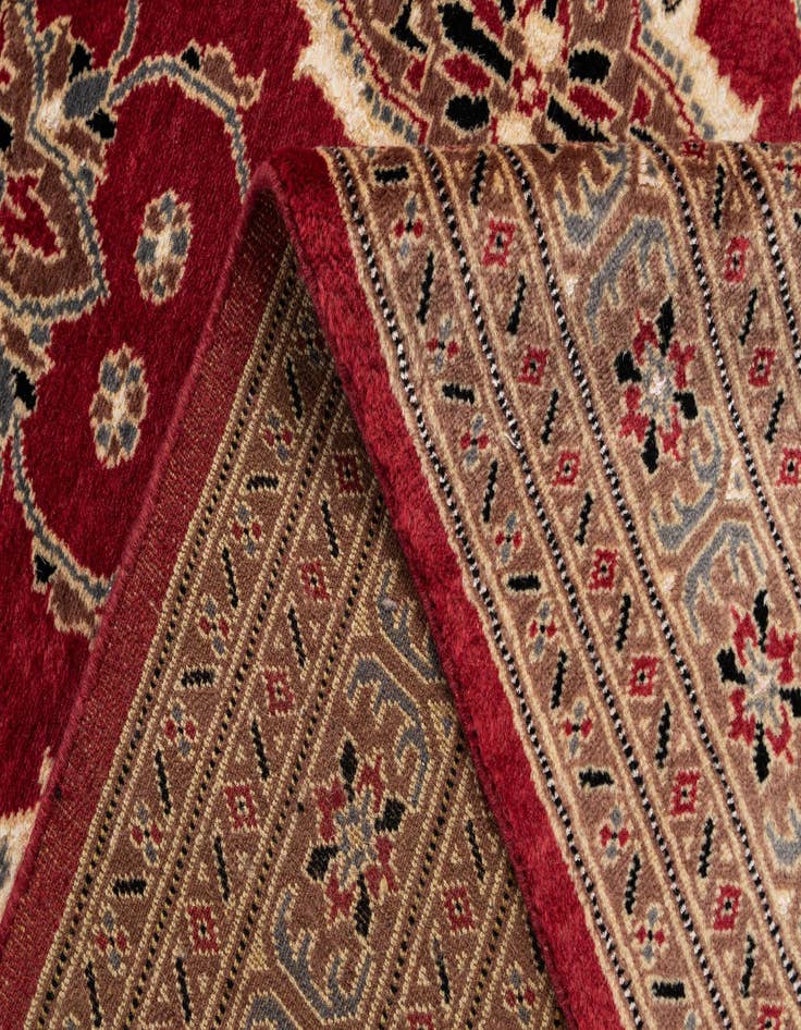 Detail image of  4' 3 x 6' 2  Hand Knotted Bokhara Oriental Rug