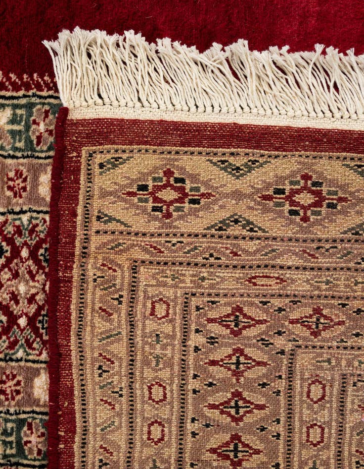 Detail image of  4' 3 x 6' 3  Hand Knotted Bokhara Oriental Rug