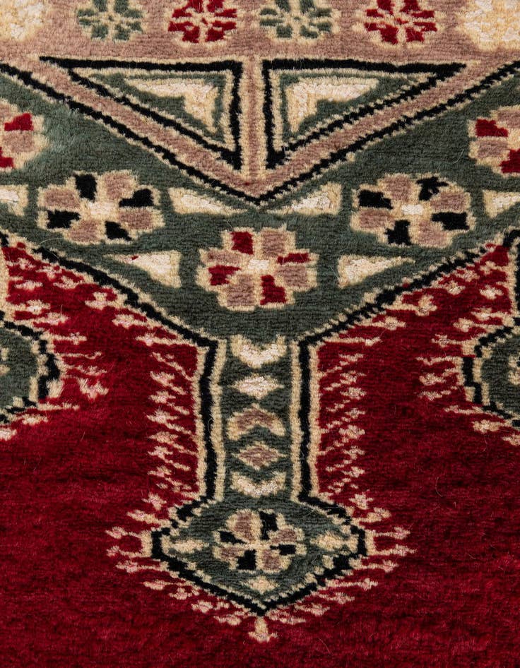Detail image of  4' 3 x 6' 3  Hand Knotted Bokhara Oriental Rug
