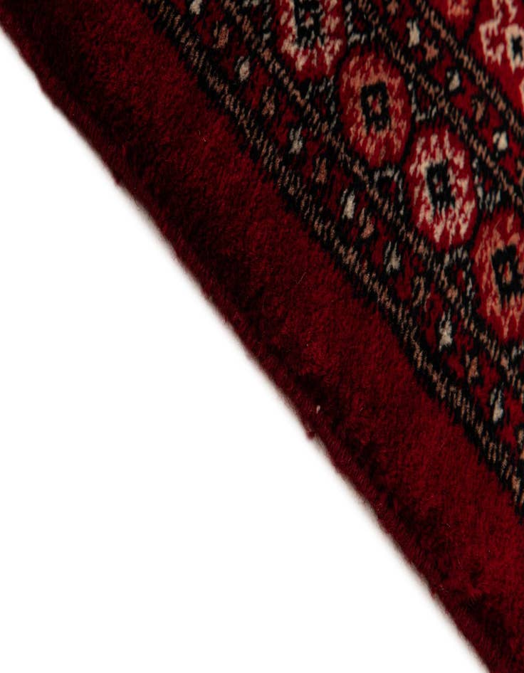 Detail image of  4' 1 x 6' 2  Hand Knotted Bokhara Wool Rug