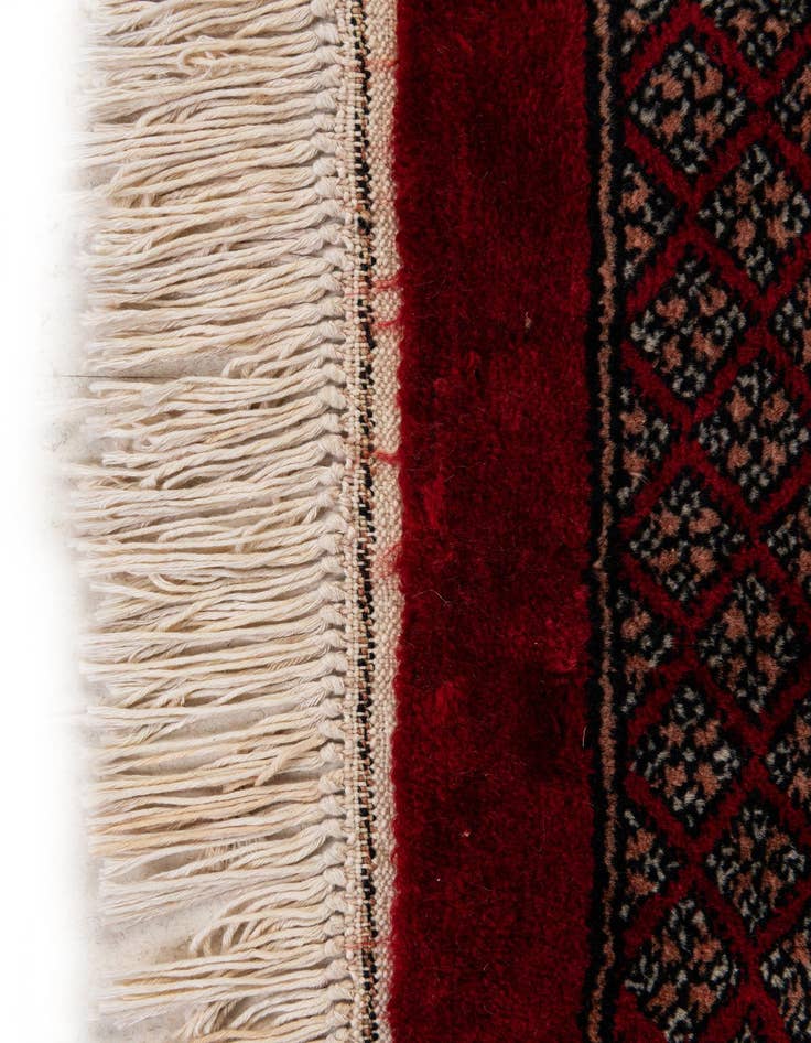 Detail image of  4' 1 x 6' 2  Hand Knotted Bokhara Wool Rug