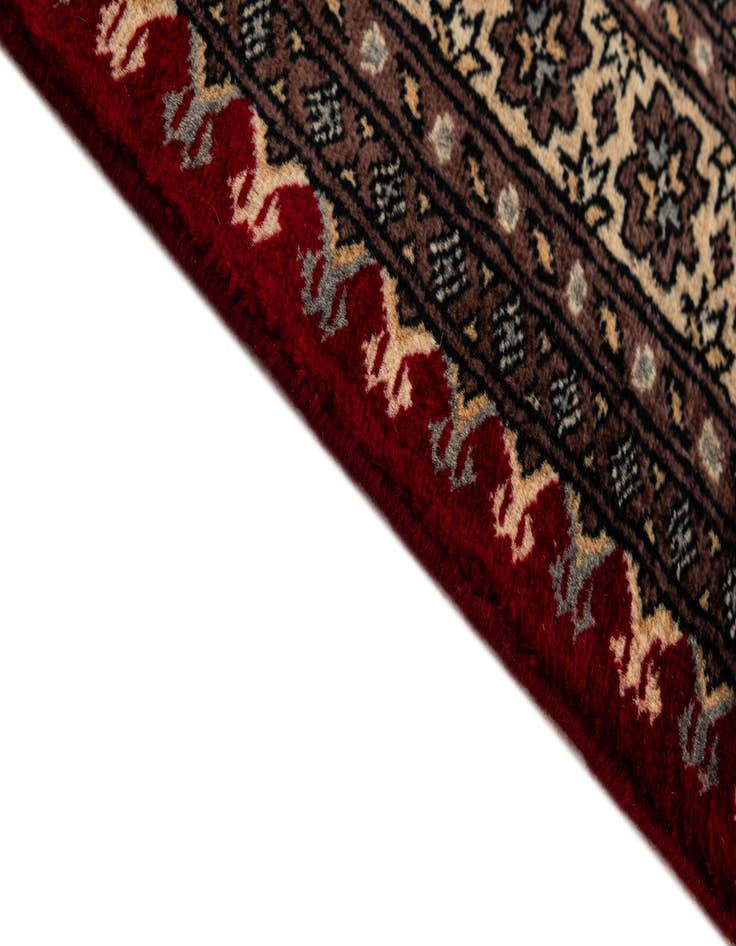 Detail image of  4' 1 x 6' 6  Hand Knotted Bokhara Wool Rug