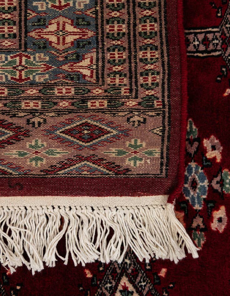 Detail image of  4' 2 x 5' 7  Hand Knotted Bokhara Oriental Wool Rug