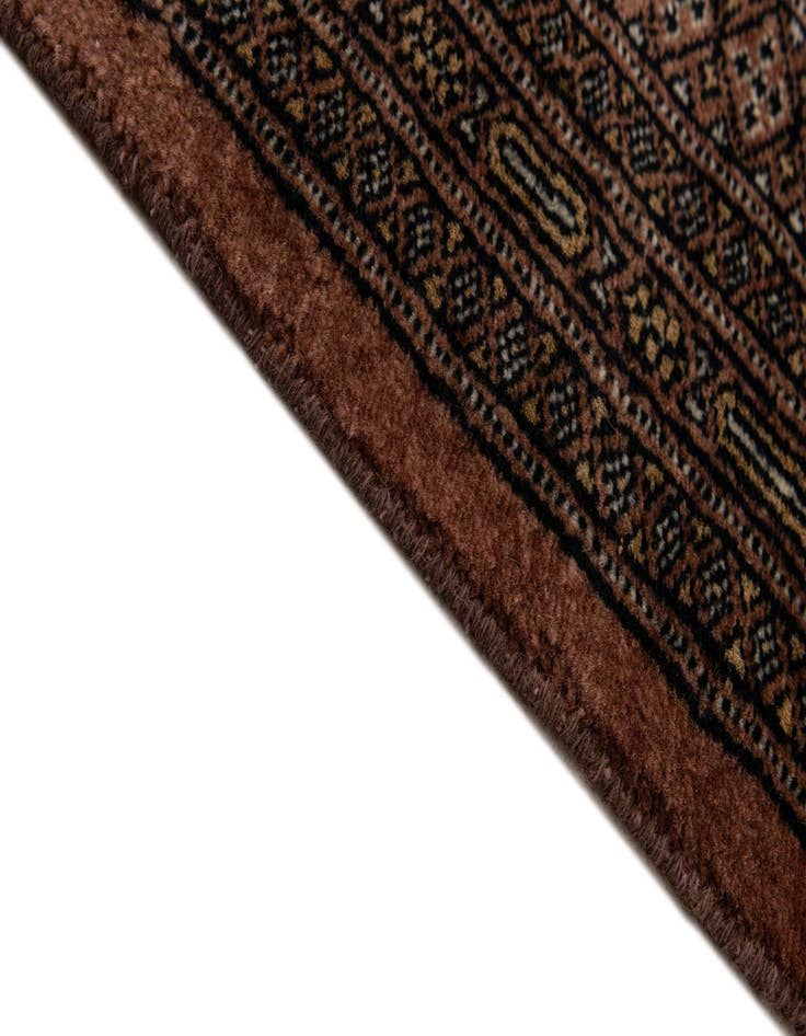 Detail image of  4' 2 x 5' 9  Hand Knotted Bokhara Oriental Wool Rug