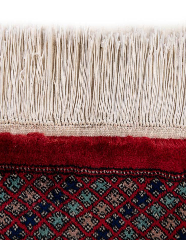Detail image of  4' 3 x 6' 2  Hand Knotted Bokhara Oriental Wool Rug