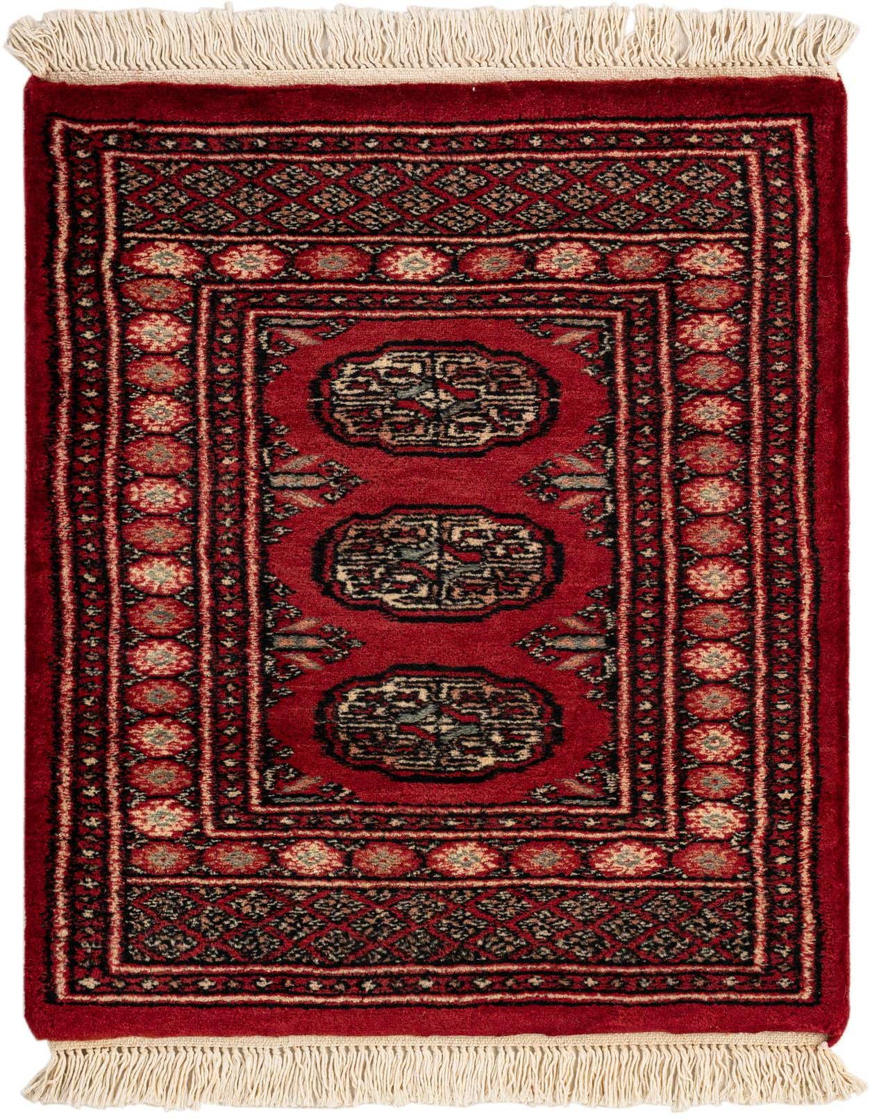 A 2x3 rectangular Bokhara rug in deep red with intricate tribal patterns and cream fringe, ideal for an entryway.