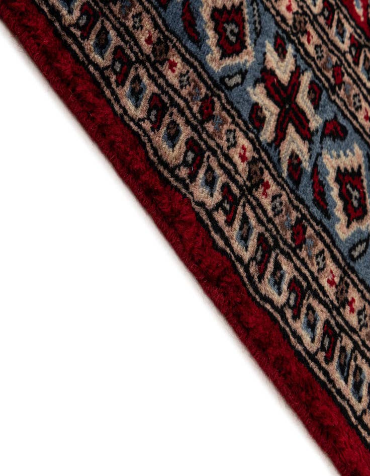 Detail image of  4' 3 x 6' 2  Hand Knotted Bokhara Oriental Wool Rug
