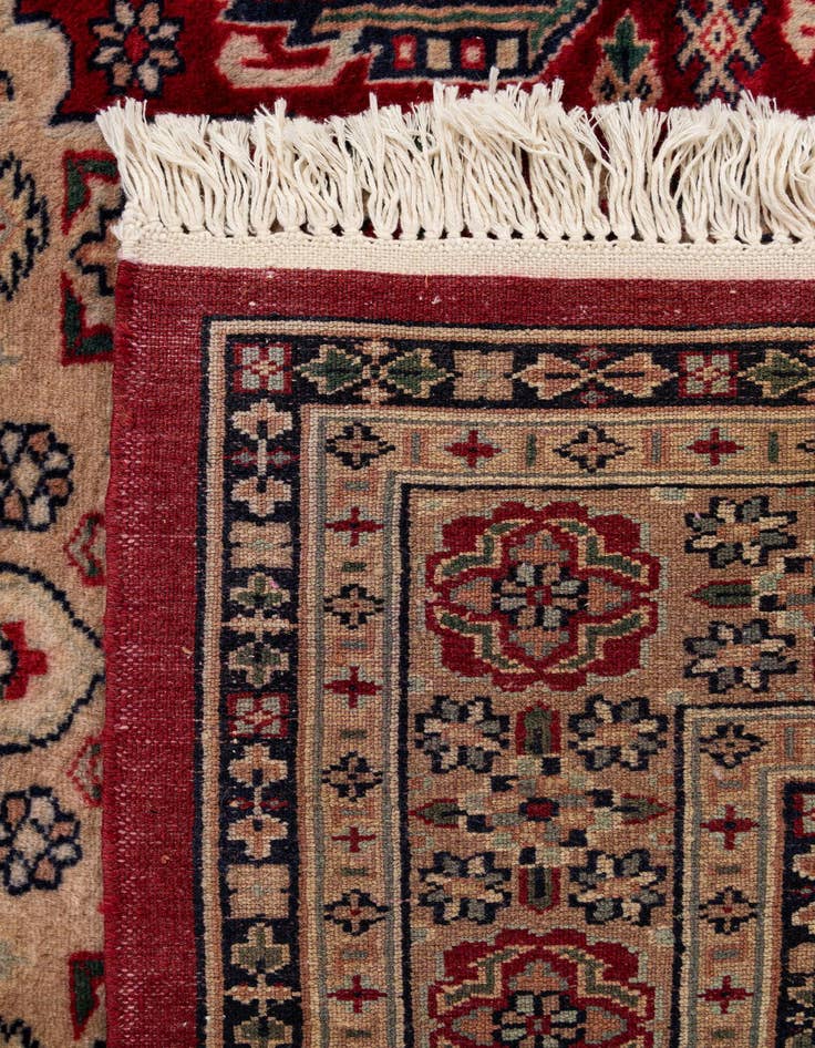 Detail image of  4' 4 x 6' 1  Hand Knotted Bokhara Oriental Wool Rug