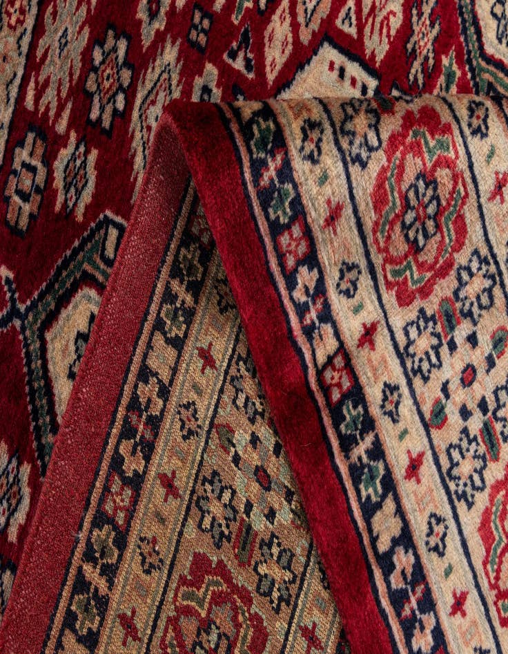Detail image of  4' 4 x 6' 1  Hand Knotted Bokhara Oriental Wool Rug