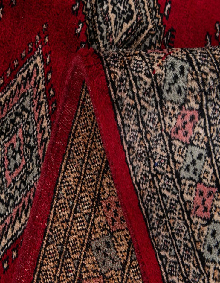 Detail image of  4' 2 x 6' 5  Hand Knotted Bokhara Oriental Wool Rug