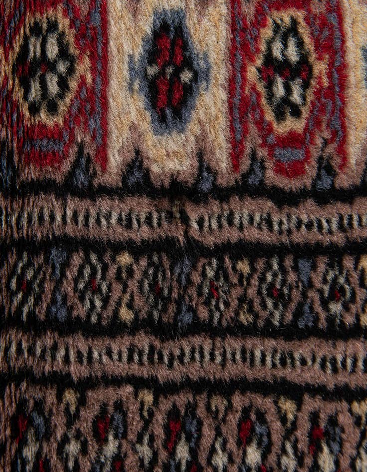 Detail image of  4' 4 x 6' 2  Hand Knotted Bokhara Oriental Wool Rug
