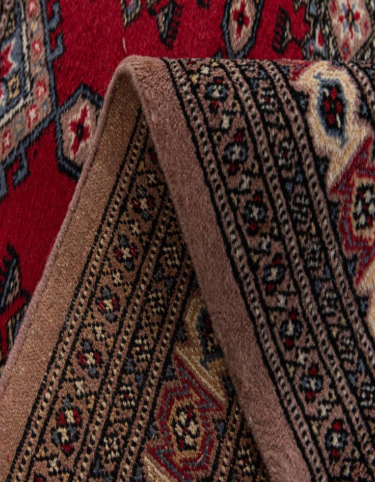 Detail image of  4' 4 x 6' 2  Hand Knotted Bokhara Oriental Wool Rug