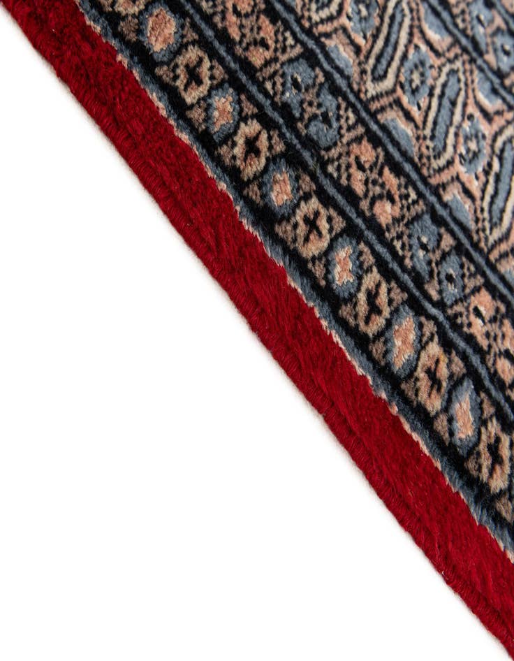 Detail image of  4' 2 x 6' 1  Hand Knotted Bokhara Oriental Rug