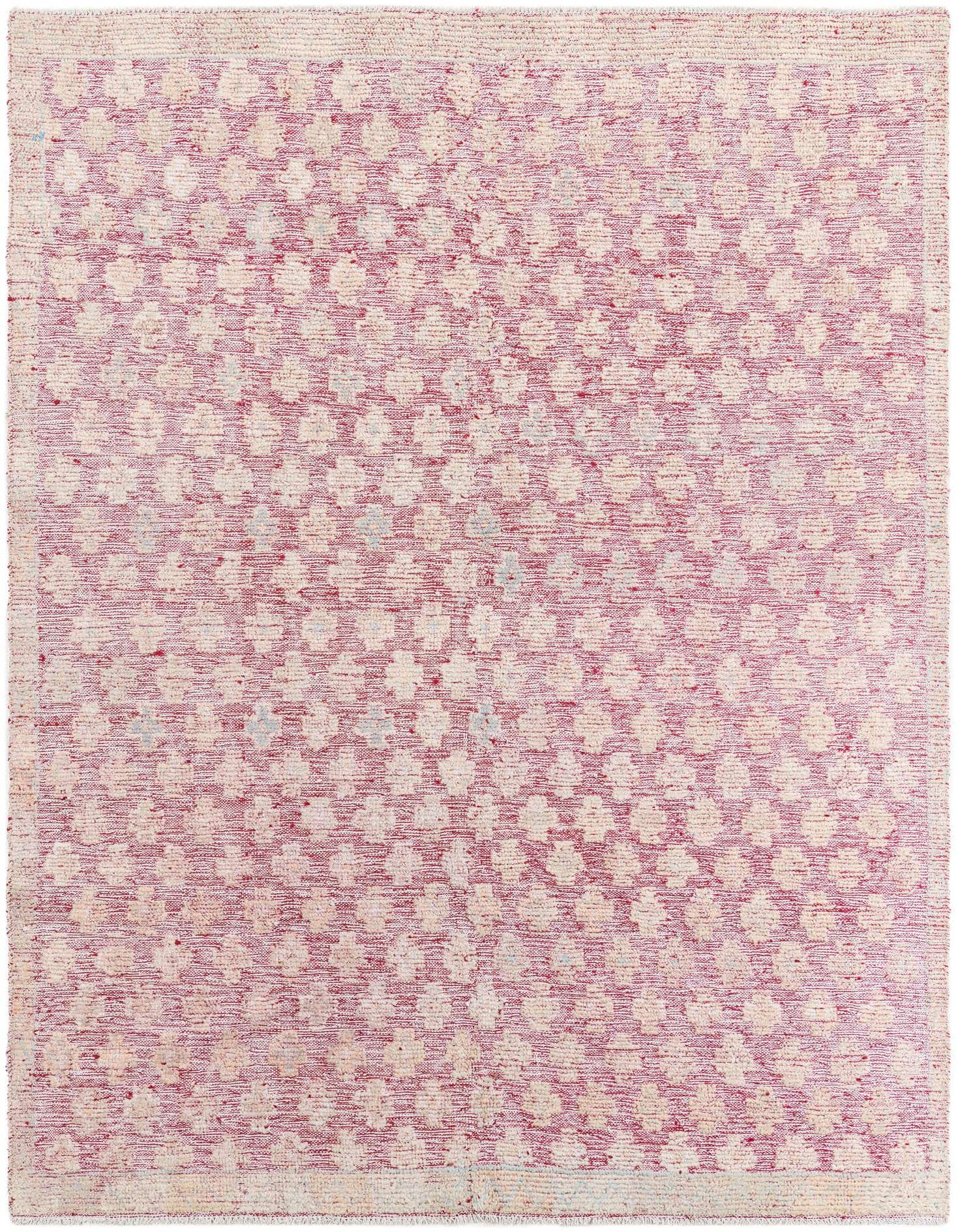 A 6x9 rectangular Darya rug with a modern pattern of red and cream hues, handmade from wool.