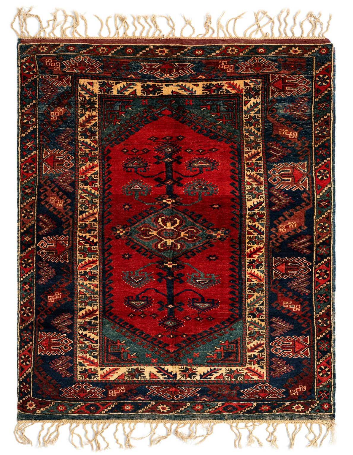 A 4x6 rectangular Dosemealti Persian rug featuring a rich red field with intricate navy, teal, and beige traditional patterns, finished with natural fringes.