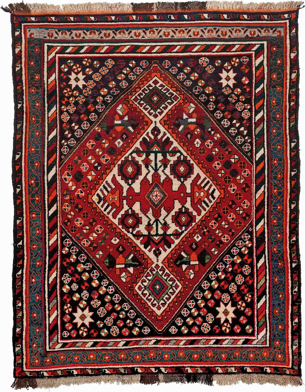 A 5x8 rectangular Gabbeh rug featuring a large central diamond motif in red, cream, and orange, surrounded by intricate geometric patterns on a dark background, with a striped border.