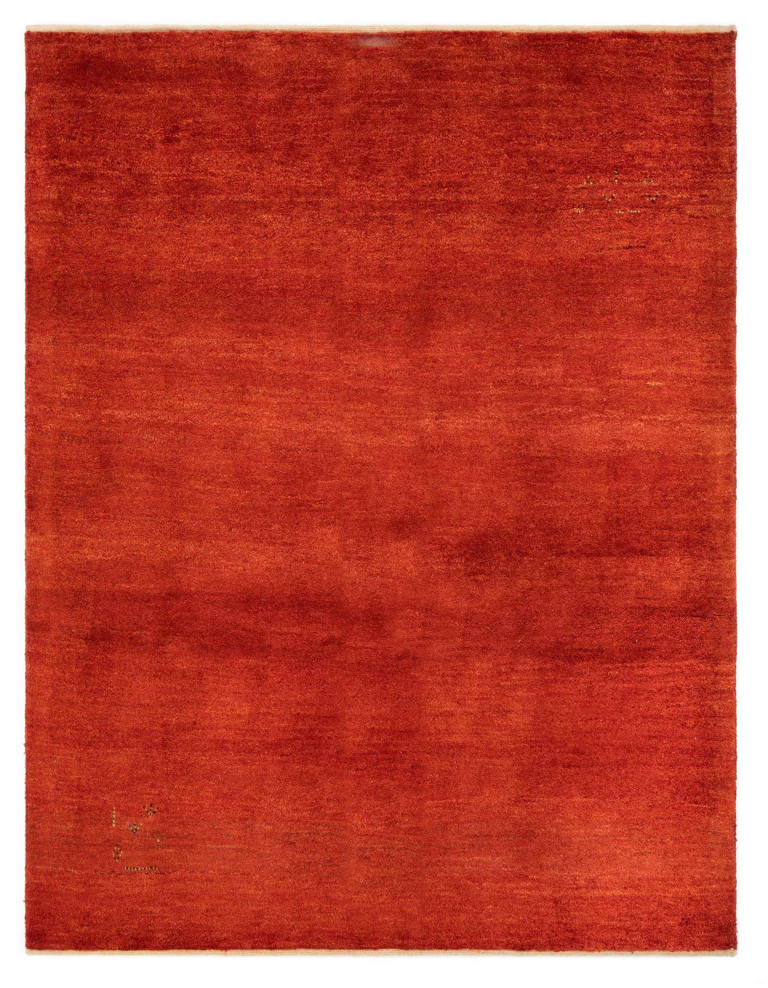 A 4x6 rectangular Gabbeh Shouli rug in rich red wool with a subtle, modern Persian design.