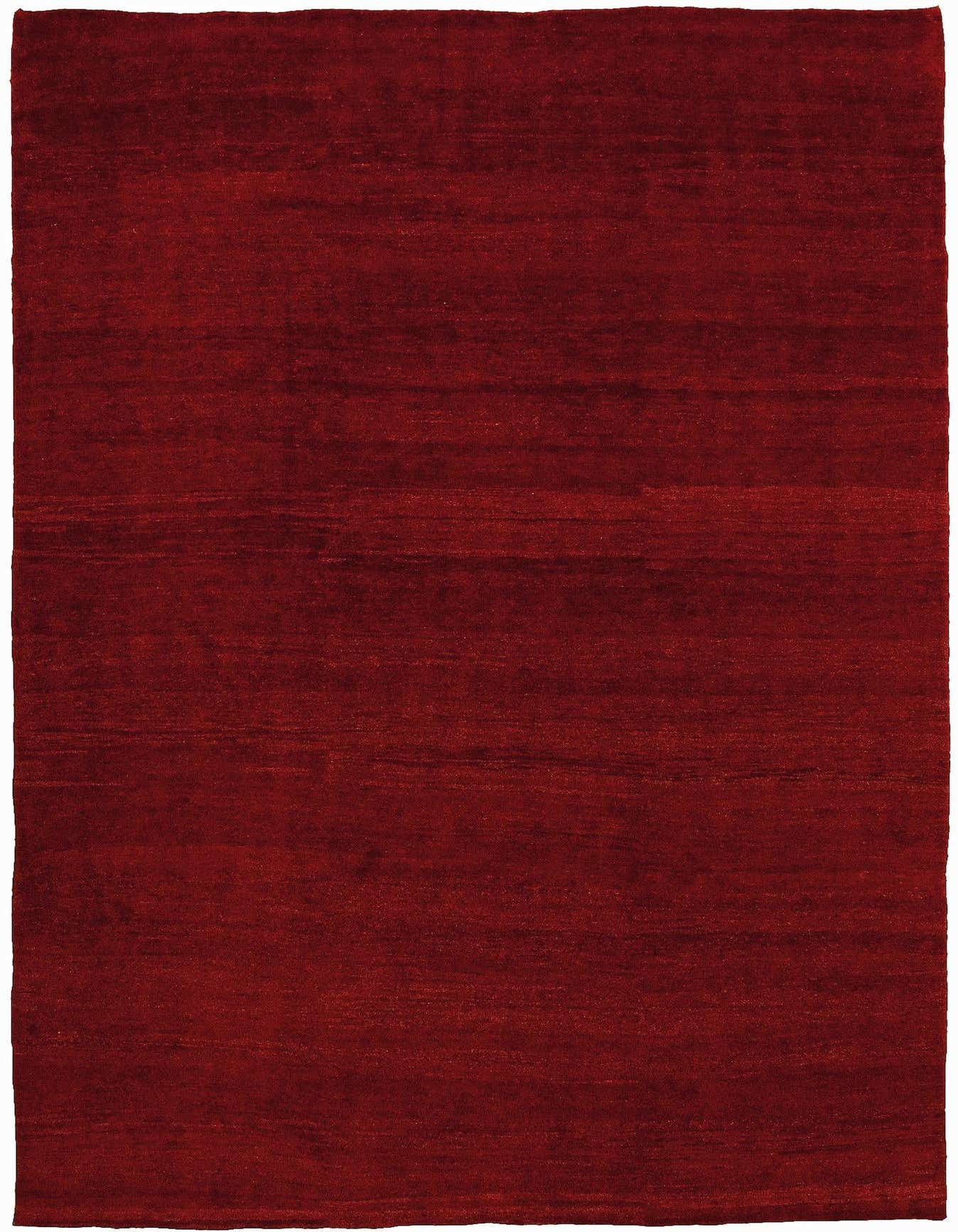 A 6x9 rectangular modern Gabbeh Shouli area rug in rich red sheep virgin wool, handmade with a medium pile.