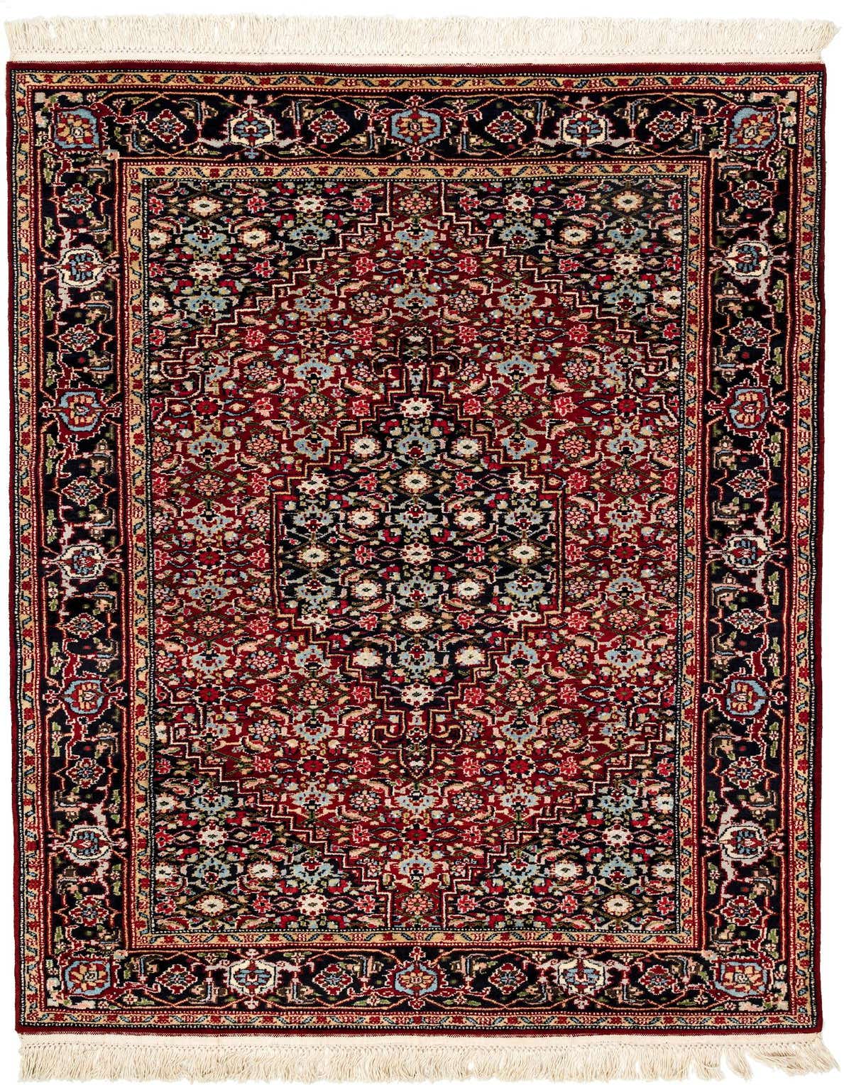 A 4x6 rectangular Hamedan wool rug featuring a rich red field with a central medallion and intricate tribal patterns in navy, blue, and cream, framed by a dark border.