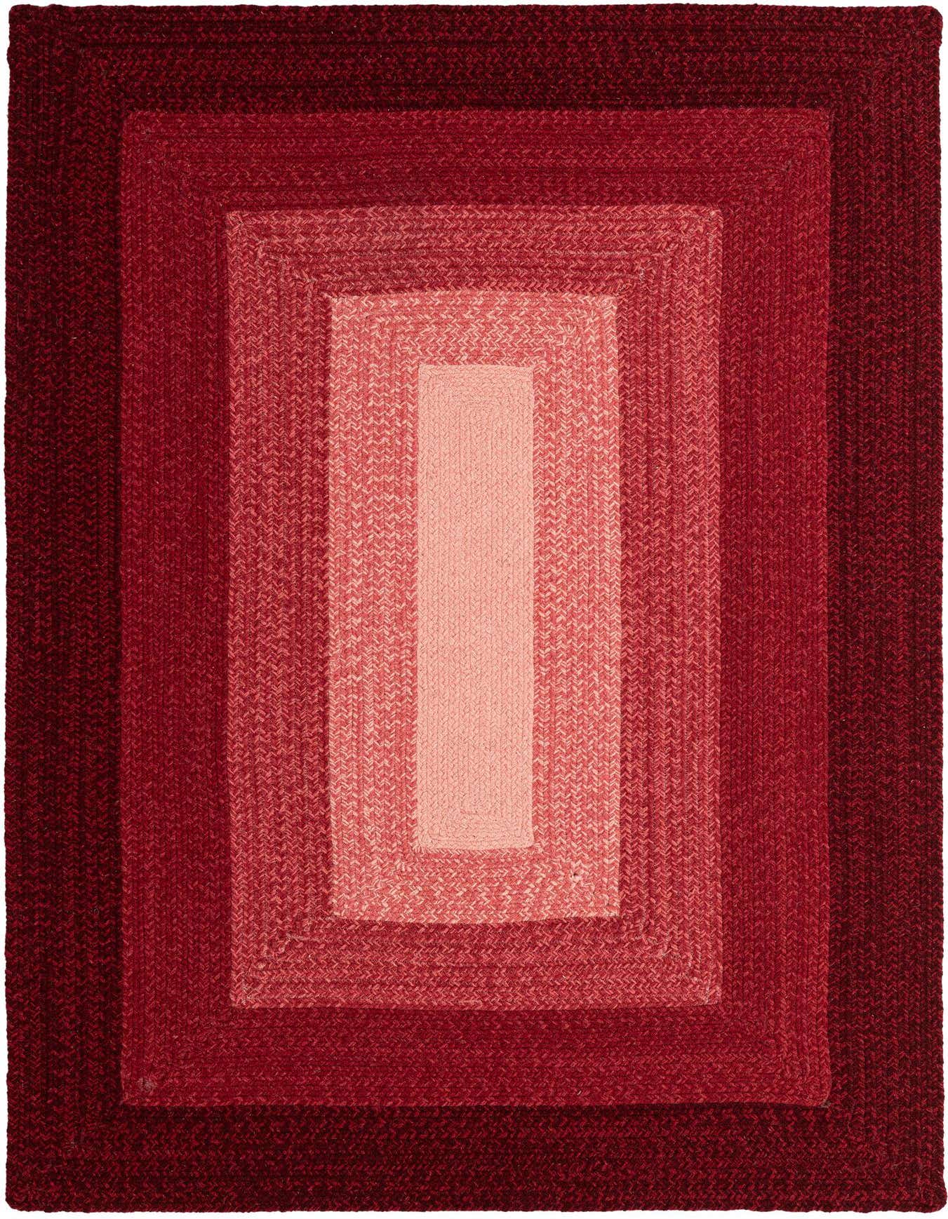 A 4x6 rectangular braided wool rug featuring concentric rectangles in varying shades of red, from deep maroon to light coral.