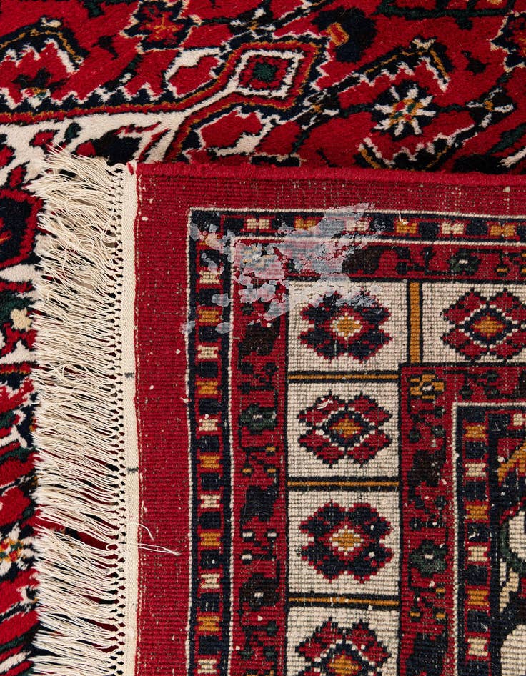 Detail image of  4' 5 x 6' 9  Hand Knotted Heriz Wool Rug