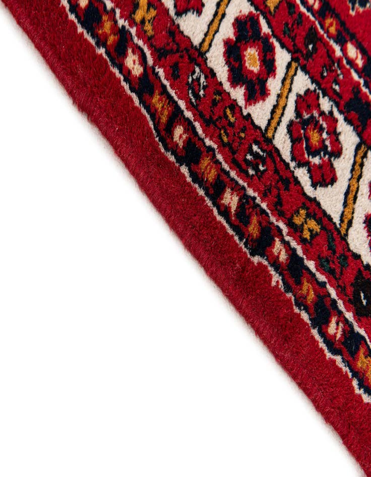 Detail image of  4' 5 x 6' 9  Hand Knotted Heriz Wool Rug