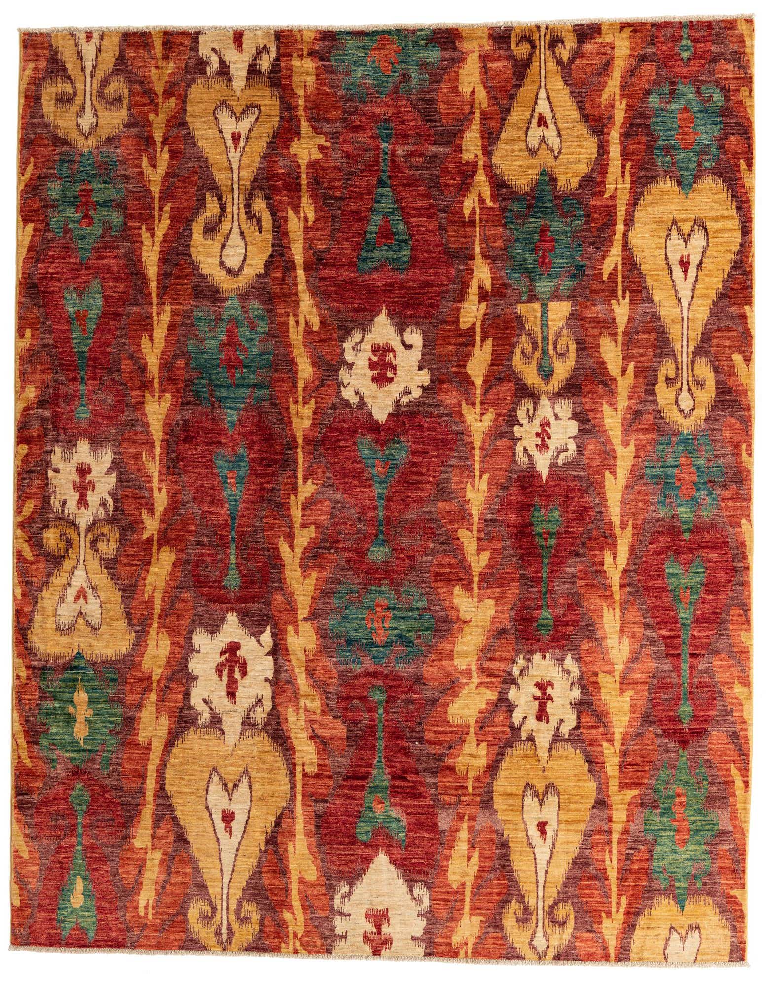 8x10 rectangular Ikat rug featuring a tribal pattern in shades of red, gold, and teal, perfect for a living room.
