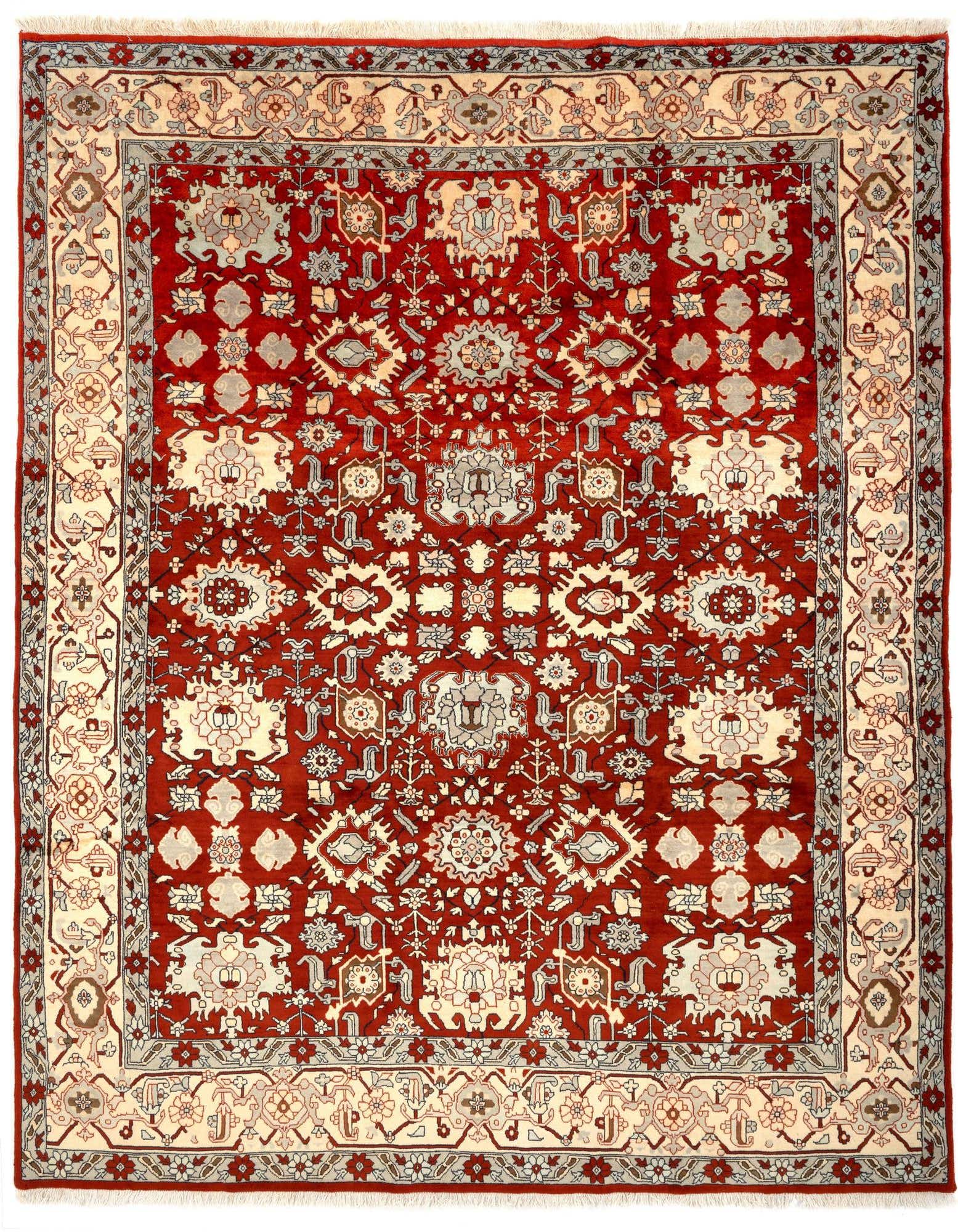 A rectangular 8x10 Indo Tabriz rug featuring a traditional Persian pattern in rich reds and cream, with intricate floral and medallion motifs.