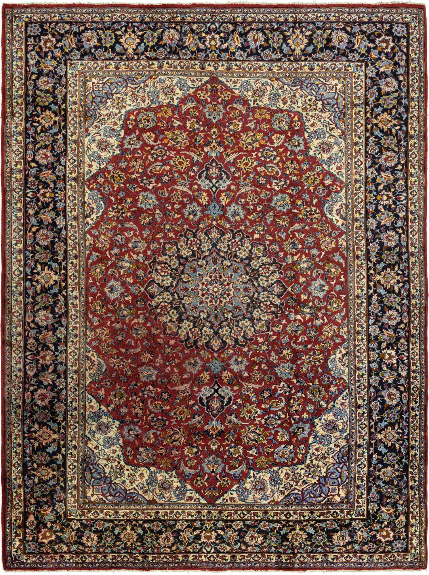 A 10x13 rectangular Isfahan rug featuring a detailed red medallion and intricate floral patterns with blue and cream accents, framed by a dark border.